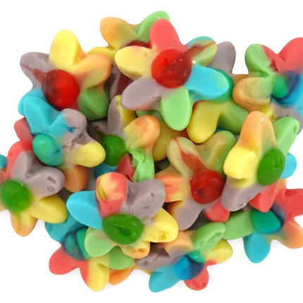 Colorful jelly rainbow flowers from Mijn winkel arranged in a vibrant display, showcasing bright, translucent floral designs.