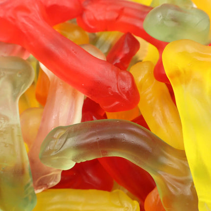Close-up of colorful fruit-flavored gummy candies in playful shapes