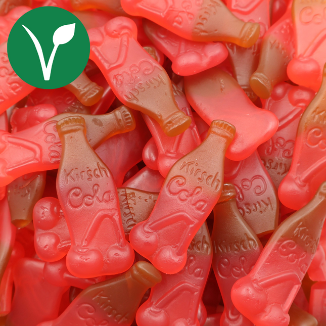 Vegan cherry cola bottle gummies, red and brown, close-up candy pile
