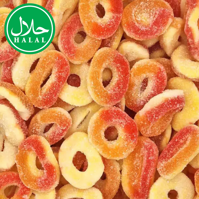 Peach ring gummy candies coated with sugar, halal certified, close-up view.