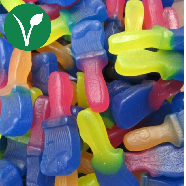 Colorful vegan gummy candies shaped like paintbrushes in assorted flavors