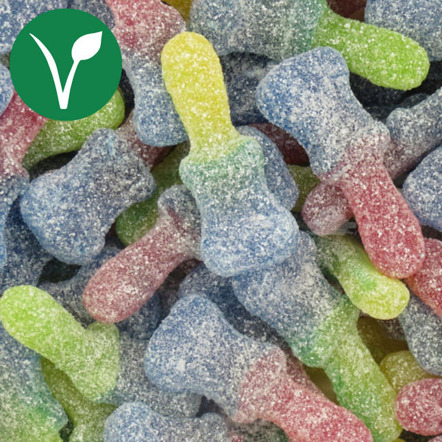 Colorful sour gummy paintbrush candies coated in sugar with a vegan label